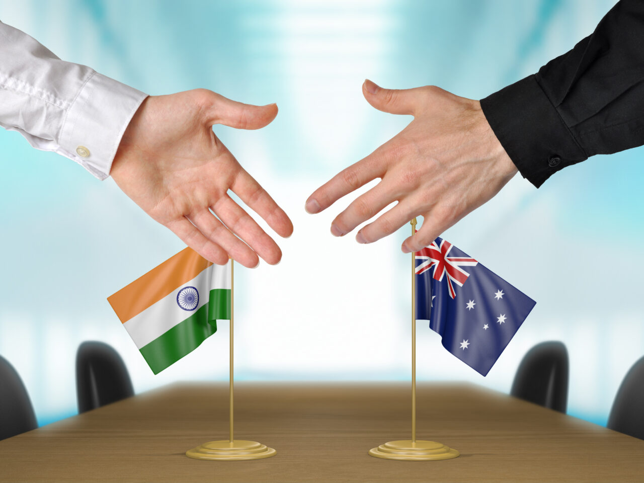 https://crossboadvisory.com/wp-content/uploads/2024/06/india-and-australia-hands-and-flag-1280x960.jpeg